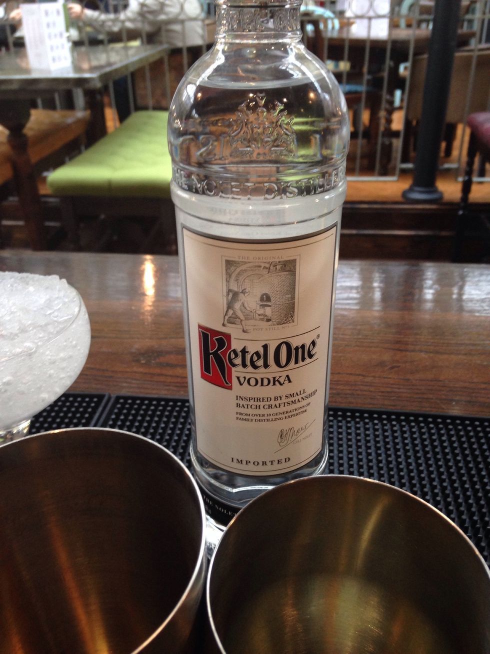 Choose a top quality vodka and add 25ml (1oz) to a cocktail shaker. The better quality the spirit, the better your martini will be..