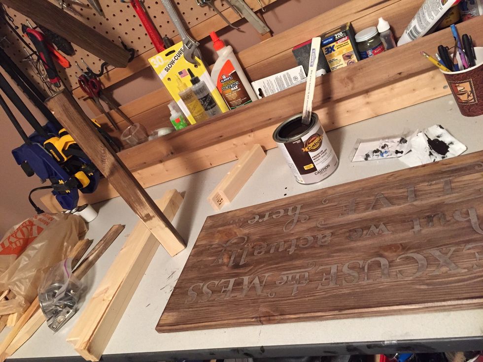 Choose a wood stain and apply 2 coats of it.  I like using a dollar store sponge but a rag or brush will work too.  \nFor this project I used an Espresso Cobot premium wood finish. \n