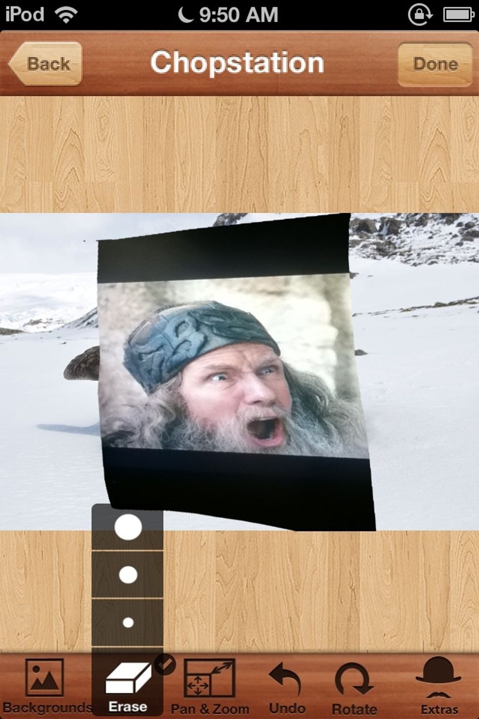 Choose an eraser. This gets rid of the picture by sliding on the picture. Remember to choose Pan & Zoom otherwise you'll erase everything!