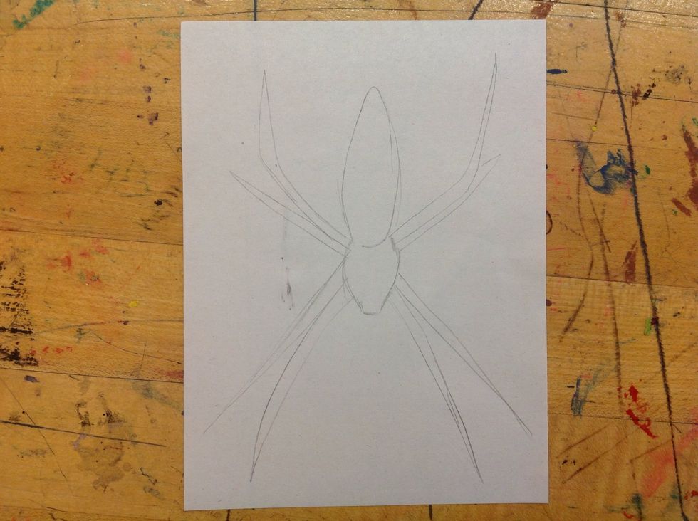 Choose an interesting insect and draw it on your 4.5" * 6" piece of paper. Try to make it as large as you can without going off the paper. Whatever you draw will be reversed in your print.