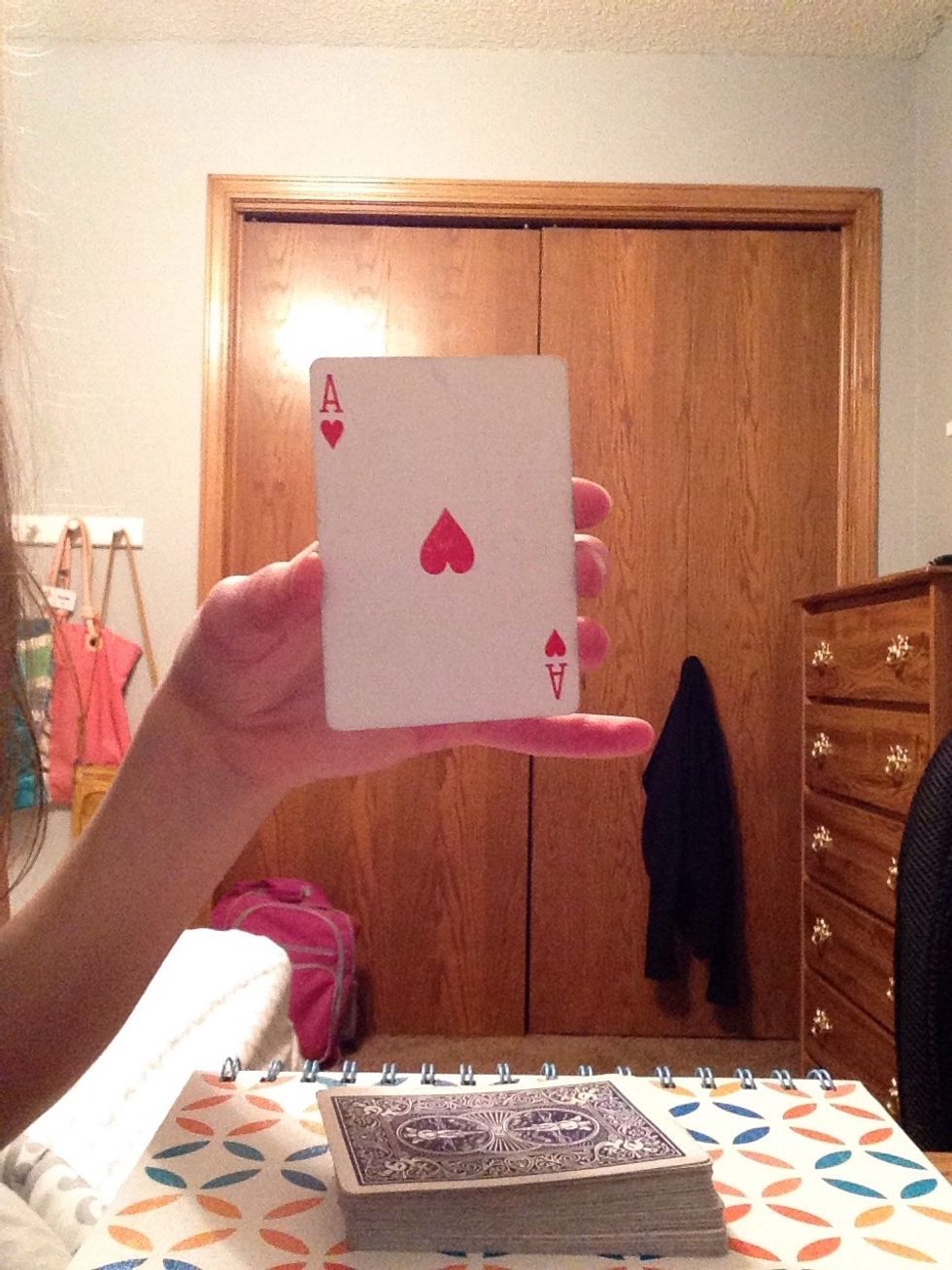 Choose any one ace from the four, and place it on the bottom of the remaining deck of cards face down.