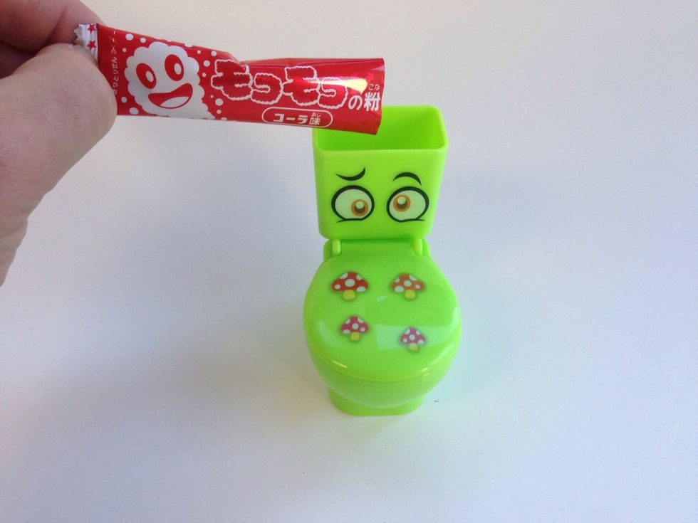 Choose one of the foaming packets and dump into toilet tank