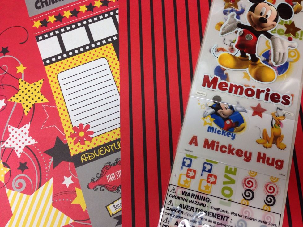 Choose paper and embellishments that complement the theme for your album. We're making a spring break Disney vacation themed album.
