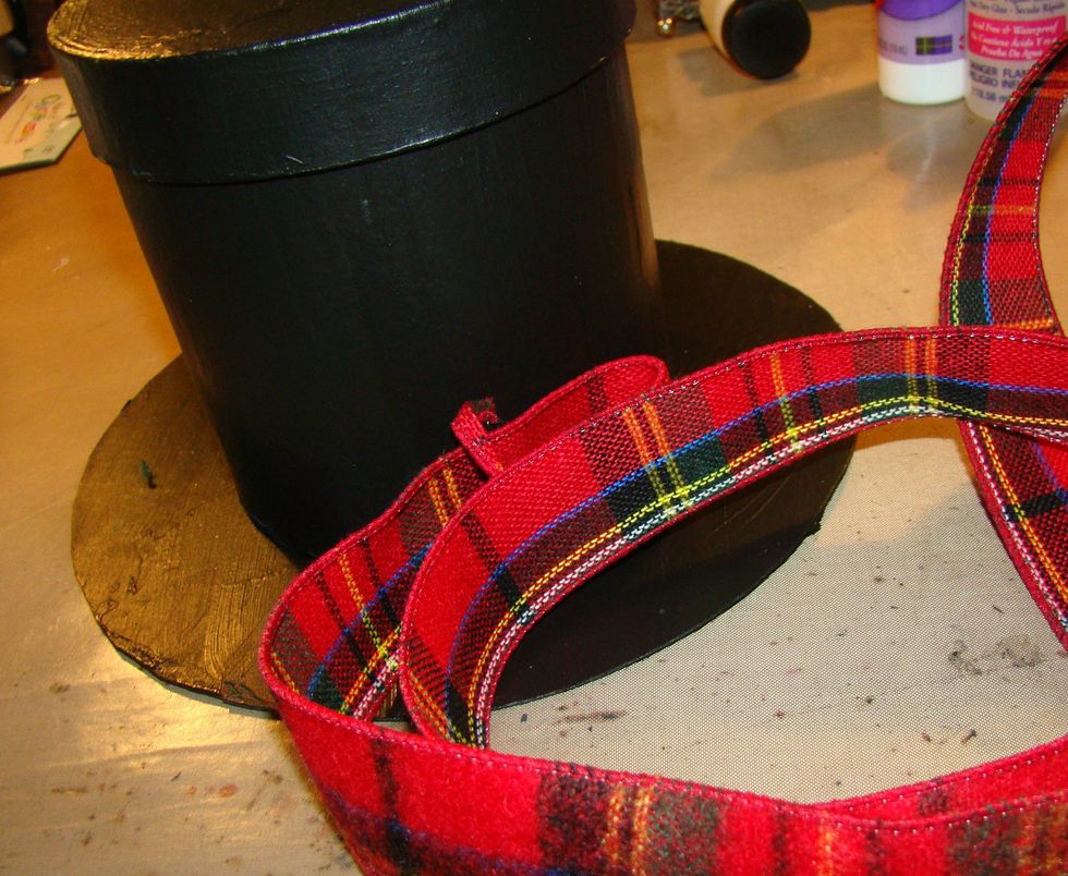 Choose some ribbon to go around the base of your hat. Mine was wired, so I removed the wire because I wanted to fringe the ends.