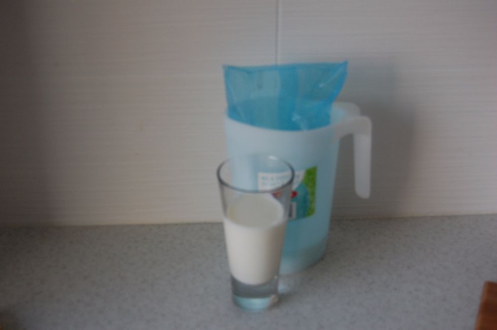 Choose the glass or cup you will be serving your smoothie in, and fill it 3/4 with milk.