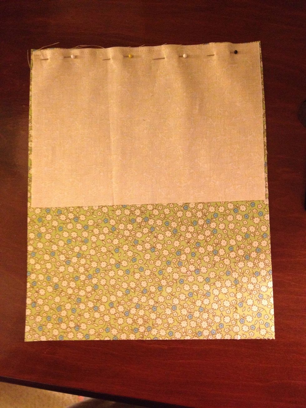 Choose the piece of 10"x8" lightweight fabric you wish to use for the back of the case. Pin the 5.5"x8" fabric (the flap) to the back along the 8" edge. Right sides together!