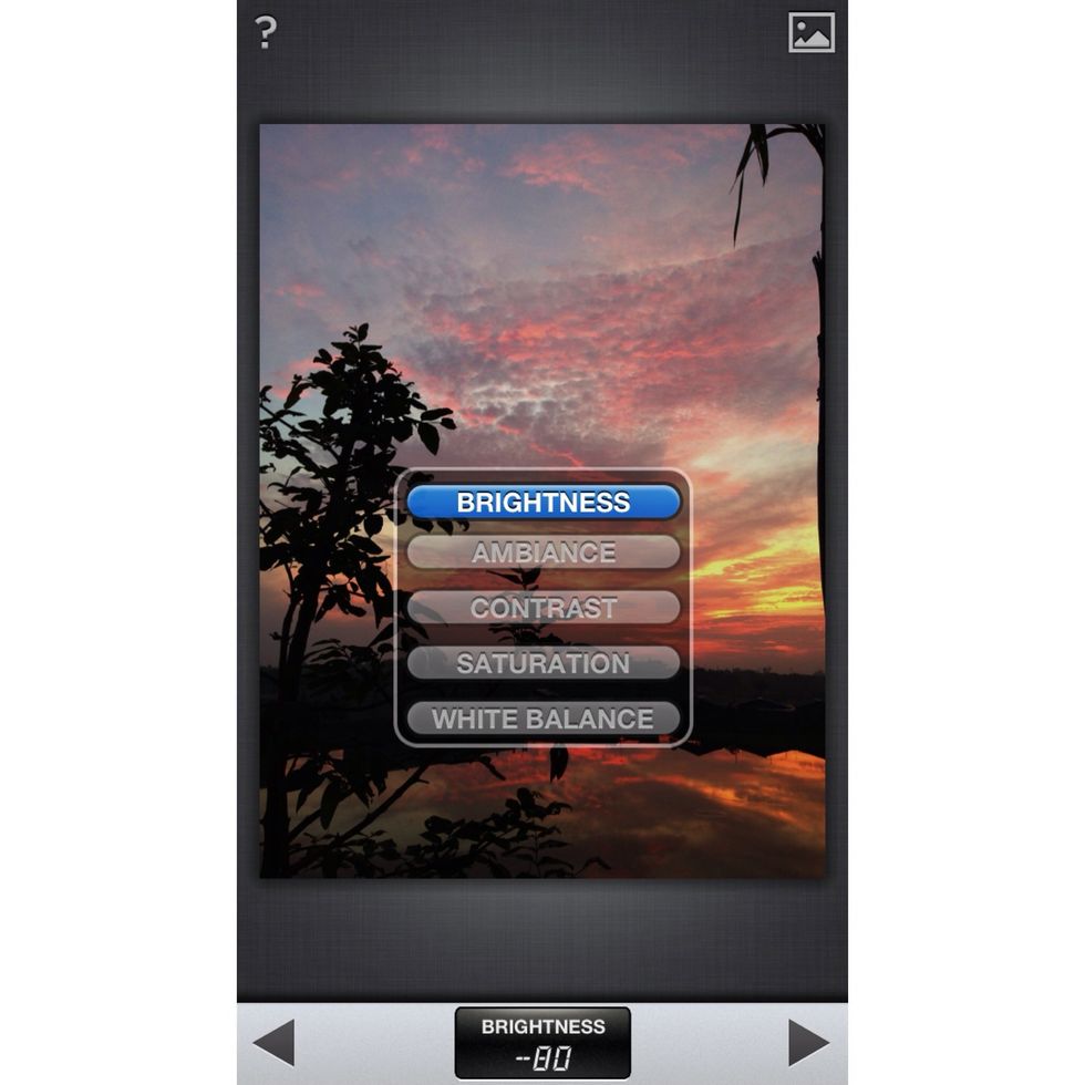 Choose 'Tune image'. There will be several things that u can change. Firstly, reduce the brightness to the number that u want.