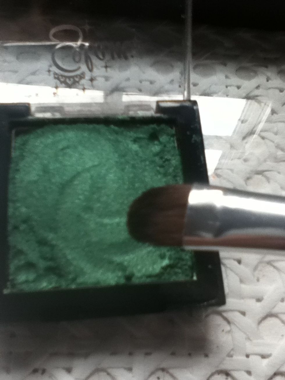 Choose your bright eyeshadow, mine is a bright green pigment from collection 2000.