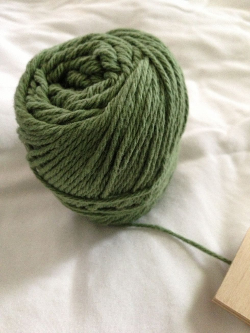 Choose your color yarn. Yarn can be found at any craft store and is fairly inexpensive depending on the type you want.