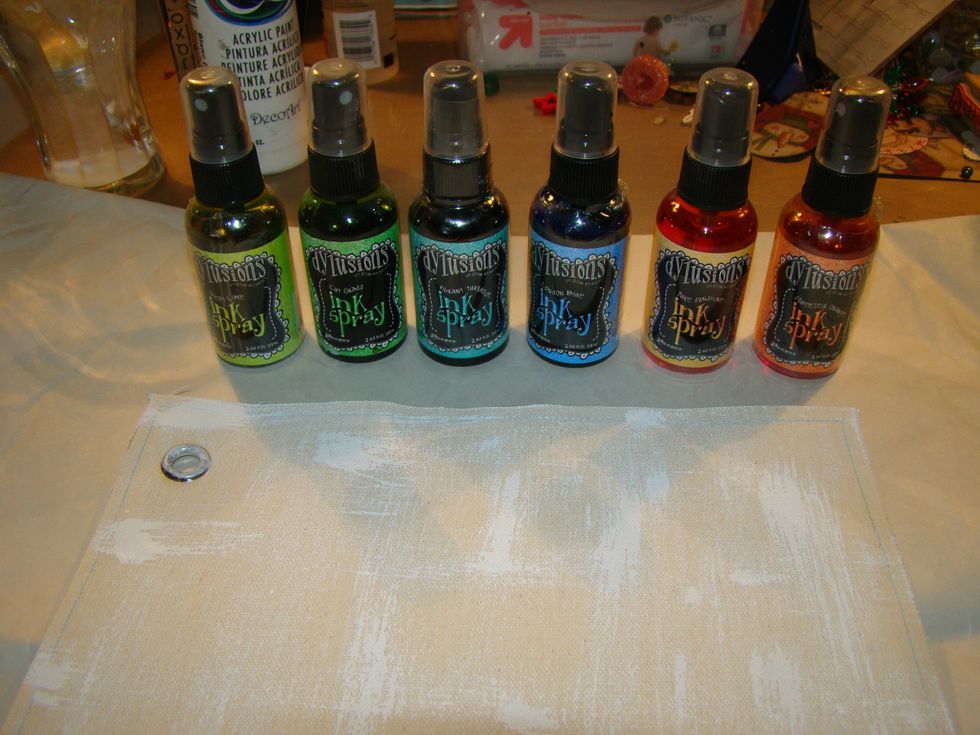 Choose your colors of Dylusion Sprays. I have found when you gesso the surface first it takes the intensity of these colors away and I wanted vibrancy on this project.