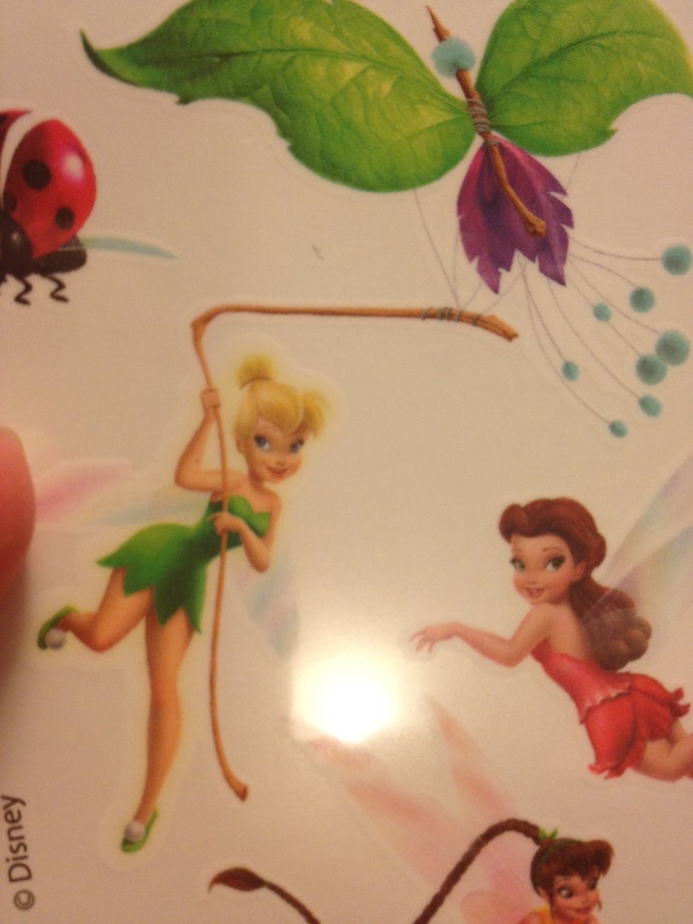 Choose your design. I chose Tinkerbell for a close friend of mine who absolutely adores her :) I found these at Walmart. You can go on eBay and find all sorts of temp tattoos.