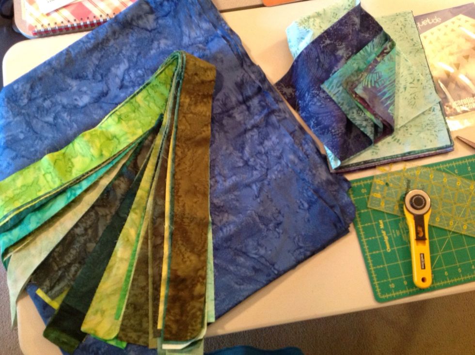 Choose your fabrics. Your pattern will tell you have many colors you will need as well as how many yards of each color.