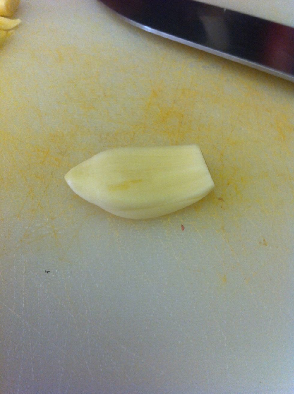 Choose your garlic clove and take off skin