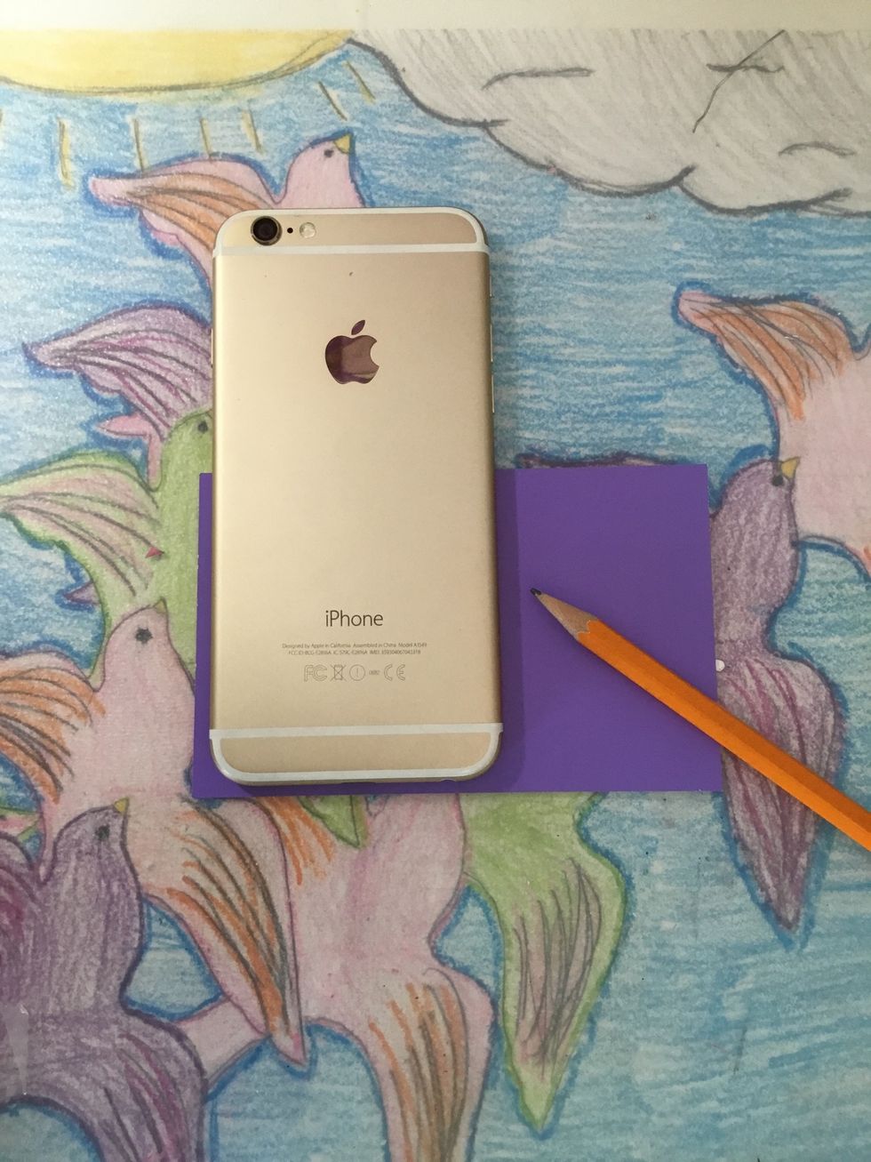 Choose your paper and trace your phone. (You can trace the whole phone or just half like mine) after that you can cut it out