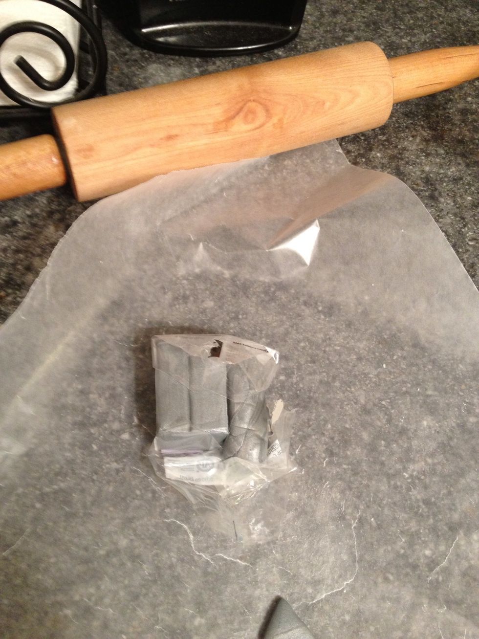 Choose your sculpey color. I used silver. Do your work on wax paper to make moving the piece around easier.