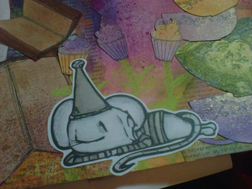 Choosing a fun character (this dormouse from the Octopoda factory), I chose to colour him in greys to make him stand out from the bright background