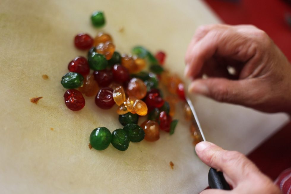 Chop 100 gms of your glazed cherries into small pieces. Again it's your choice on he size of your chopping but don't leave big chunks and don't mince too small. Demanding aren't I? ;)