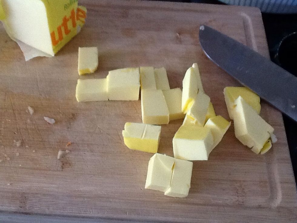 Chop 125g butter, butter is best softened or at room temperature.