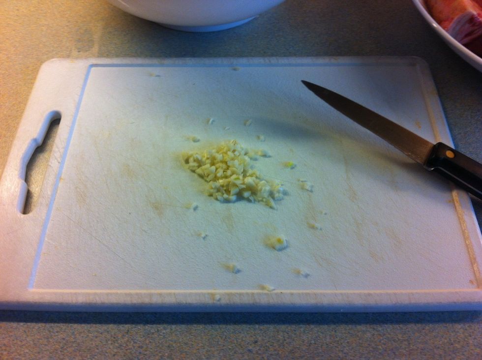 Chop 2 cloves of Garlic into tiny pieces..