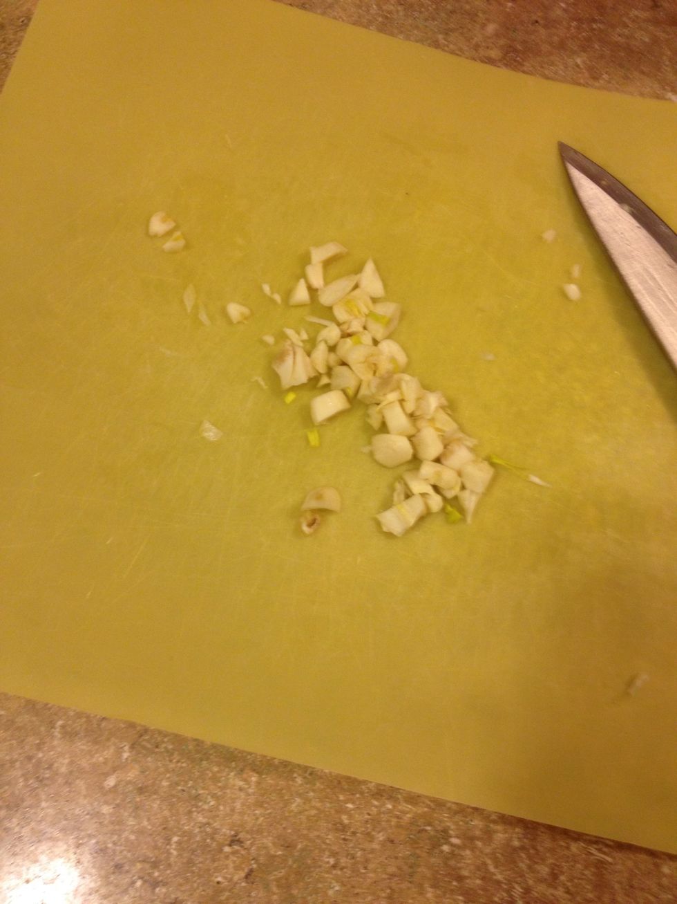 Chop 4 garlic cloves