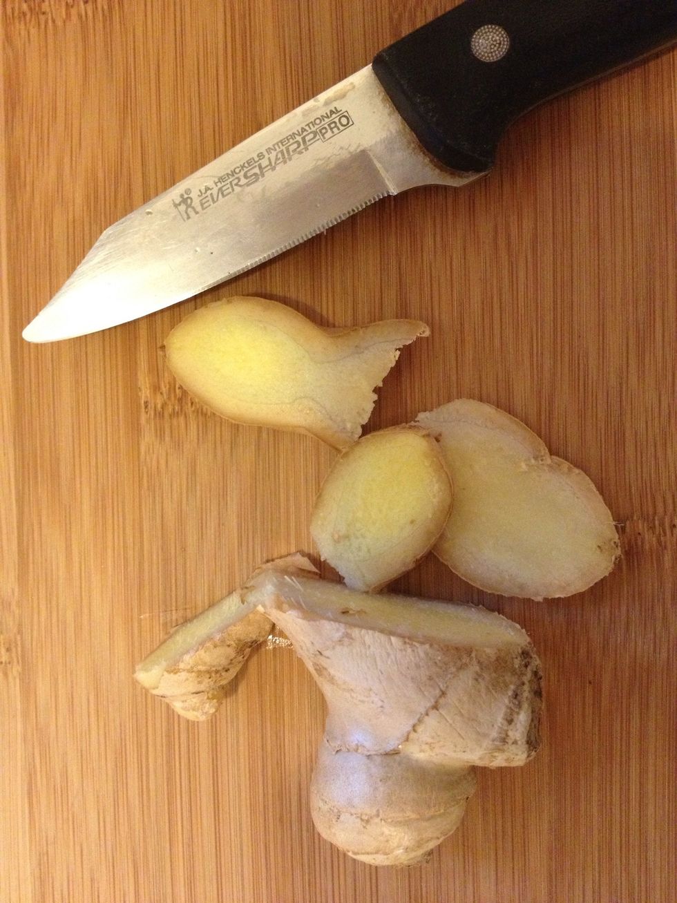 Chop a little fresh ginger (1-3 slices) and put into blender. This adds a warm and spicy flavor to the sweet root vegetables. You could add any alternative or additional spices or herbs now too.