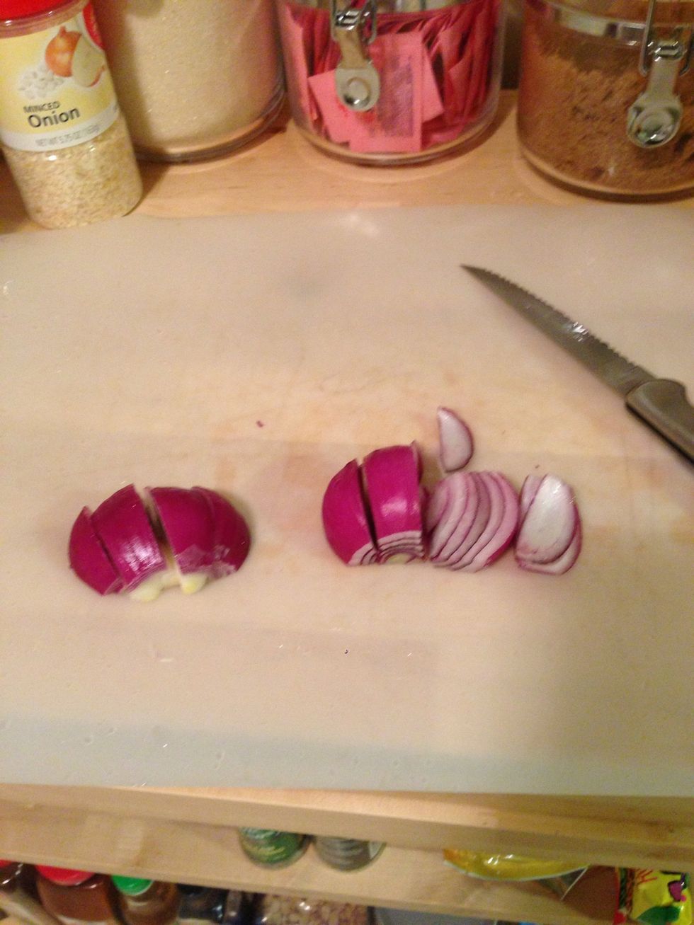 Chop a medium onion or half of a large red onion in chunks.