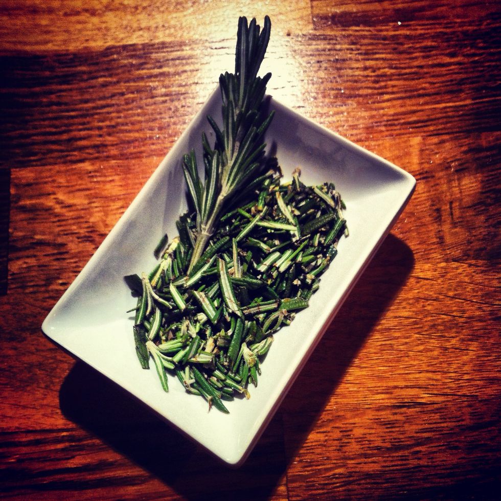 Chop about a tablespoon of fresh Rosemary and reserve a nice sprig for later. That's a nice word, 'sprig'!   Under NO circumstances be tempted to use dried rosemary. You'd be better off omitting it!