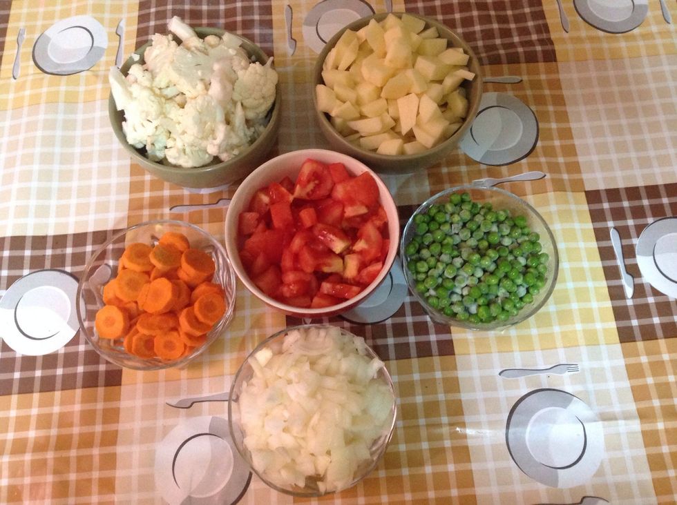 Chop all the vegetables.