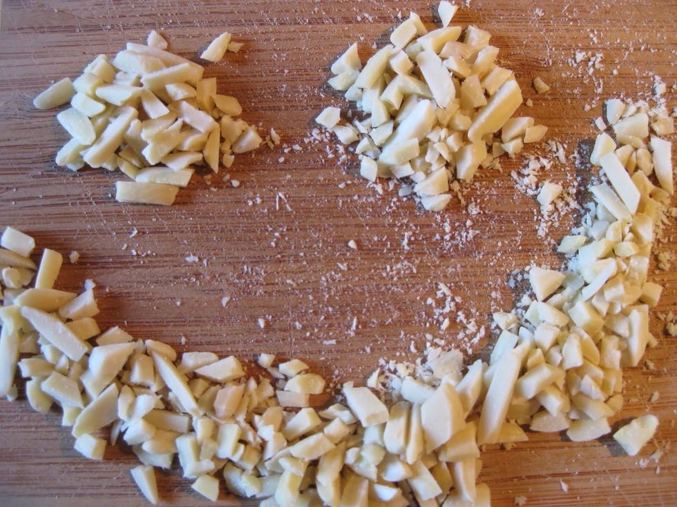 Chop almonds and add them to the cold rice along with sugar, vanilla.