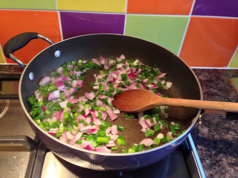 Chop and shallow fry some onion and scallions