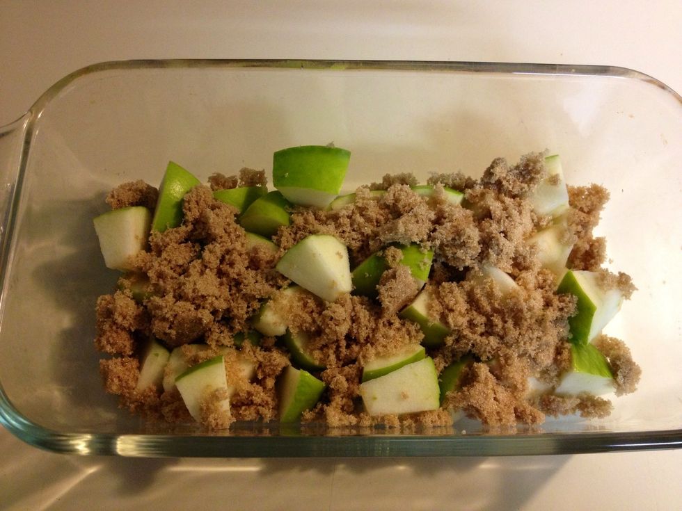 Chop apples into bite-size pieces. Use apple of your choice. Add to a baking dish and sprinkle with brown sugar.