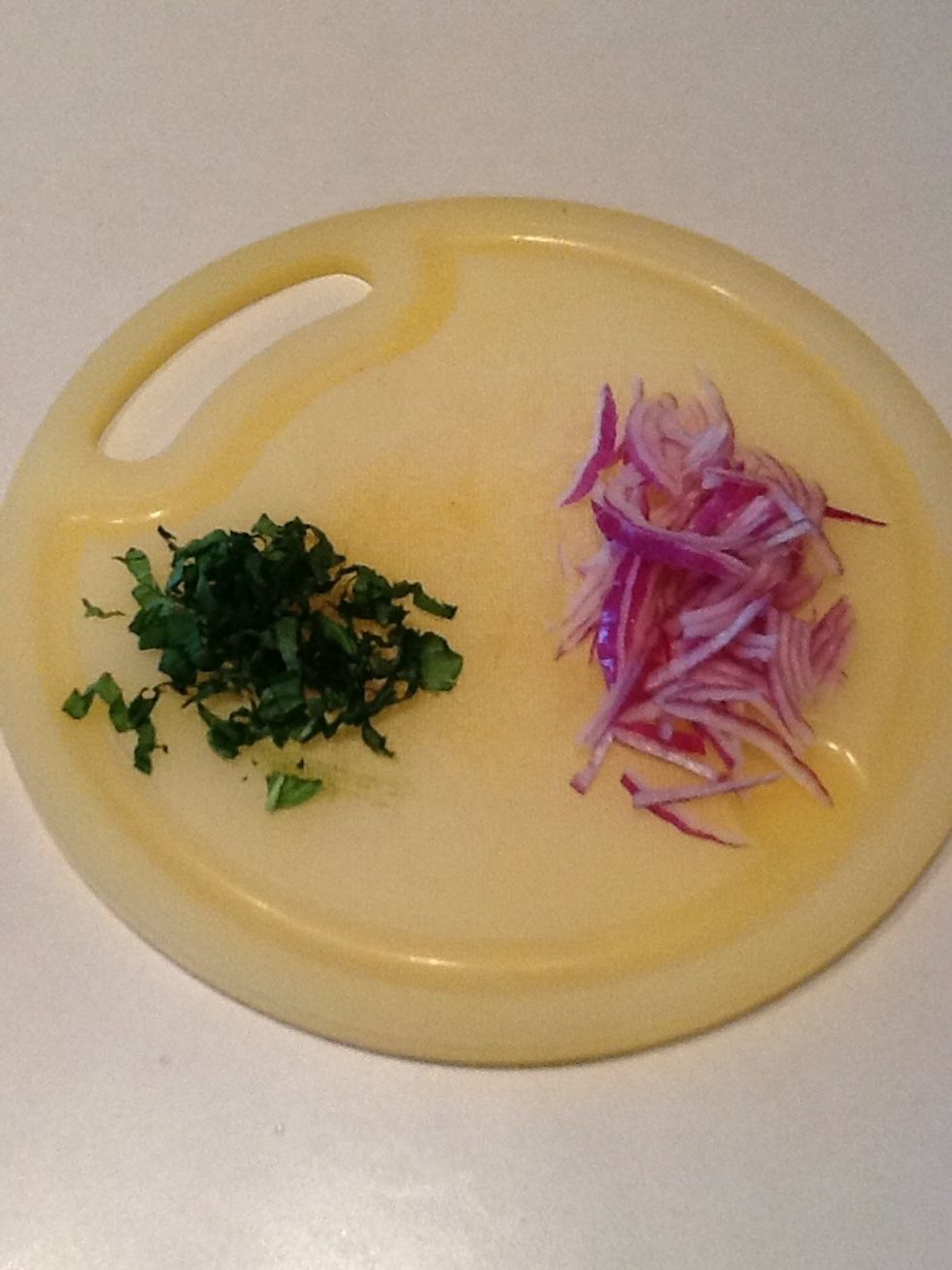 Chop basil and red onion in very thin slices.