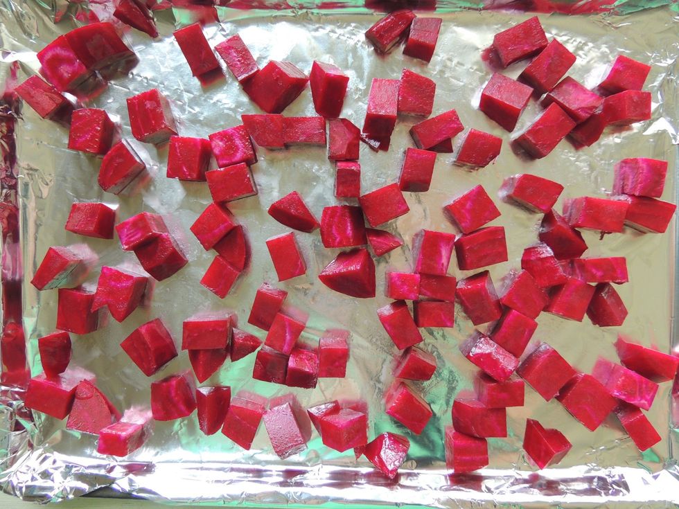 Chop beet into small cubes. Preheat oven to 350 degrees. Add beet cubes tossed in a bit of olive oil to lined pan and roast for 30 minutes.