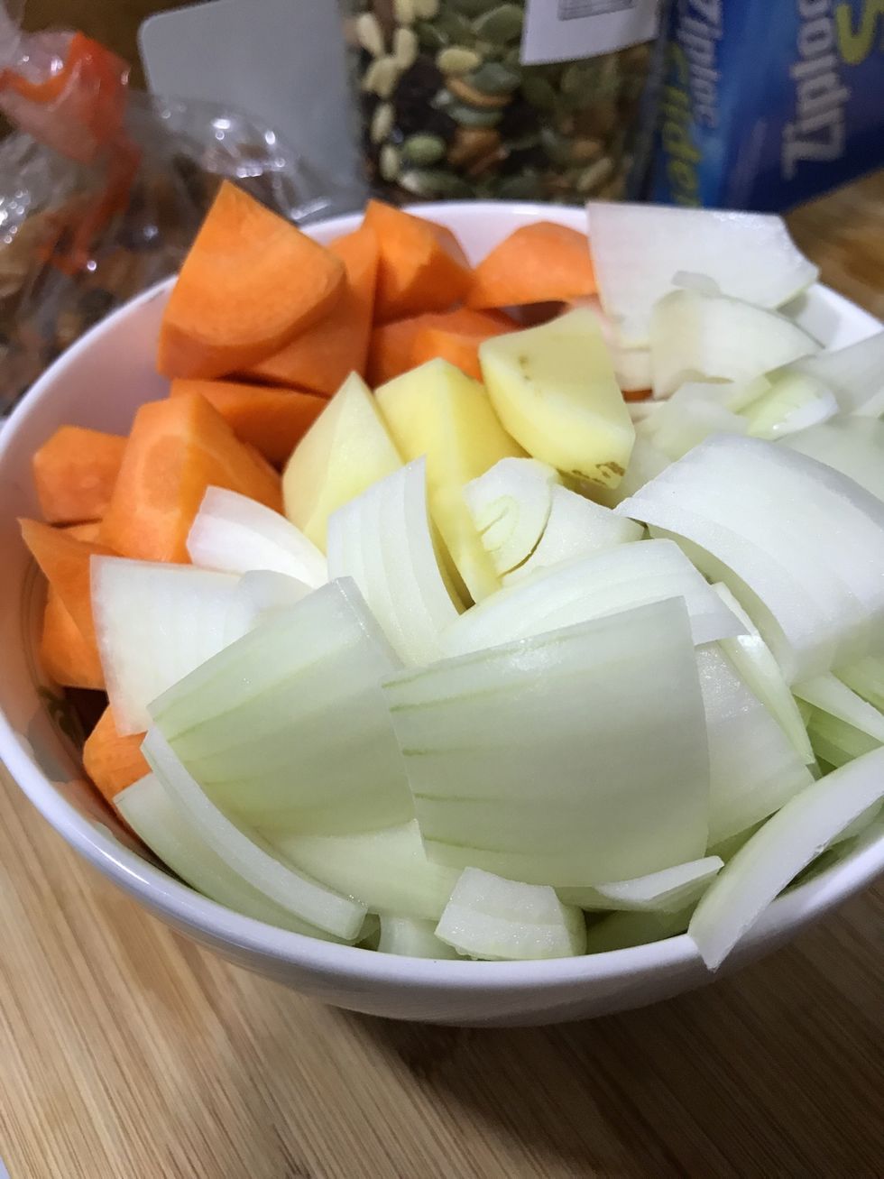 Chop carrot, potato, onion into small cubes