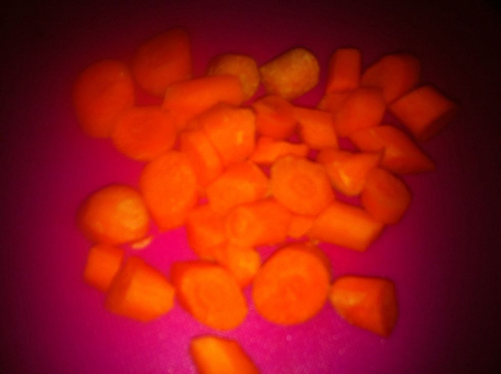Chop carrots, add to boiling water