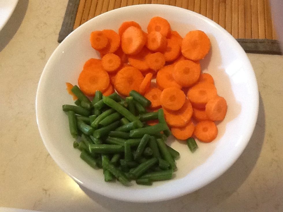 Chop carrots and beans
