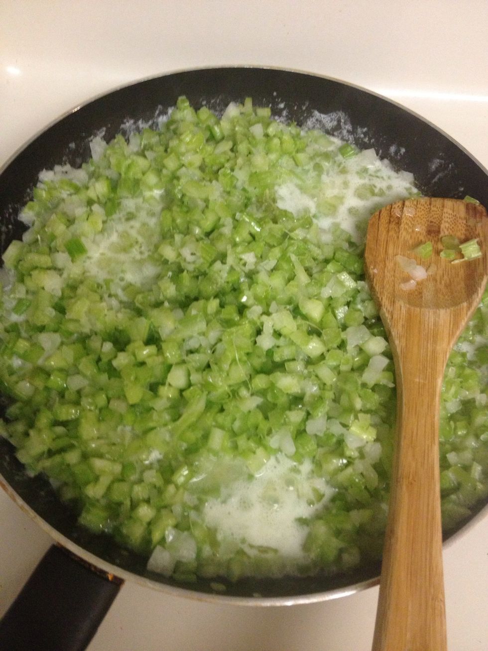 Chop celery and onions. Melt butter in sauce pan and saut\u00e9ed.