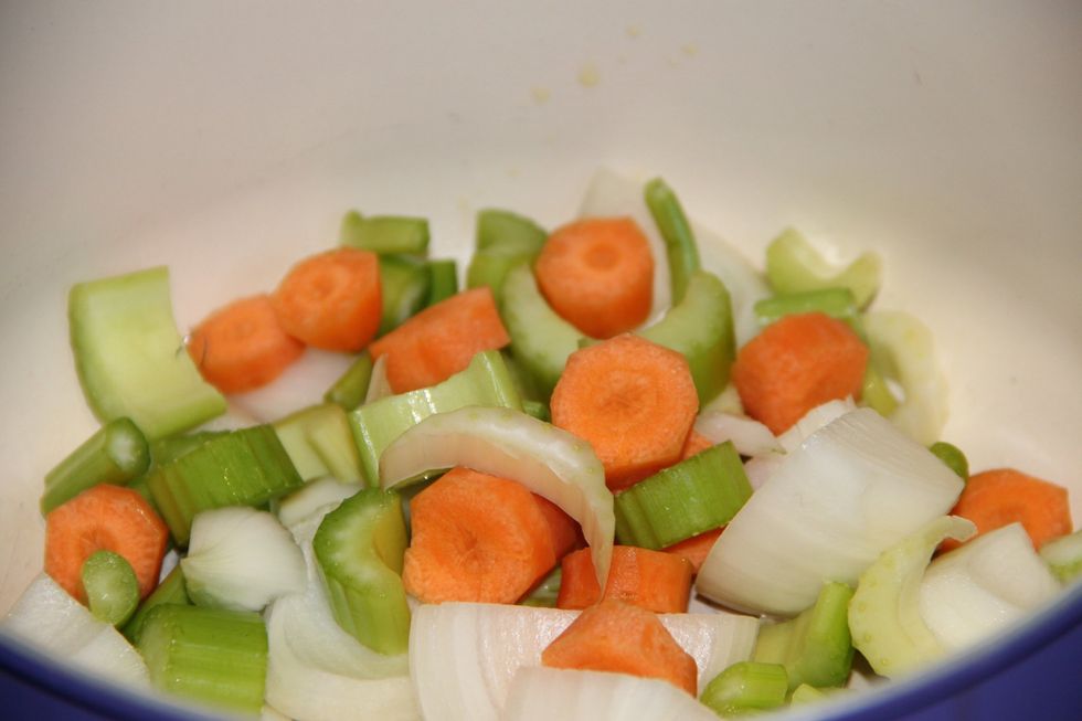 Chop celery, carrots and onion and put in pan with a drop of olive oil and clove of garlic and start sauteing for about 5 minutes