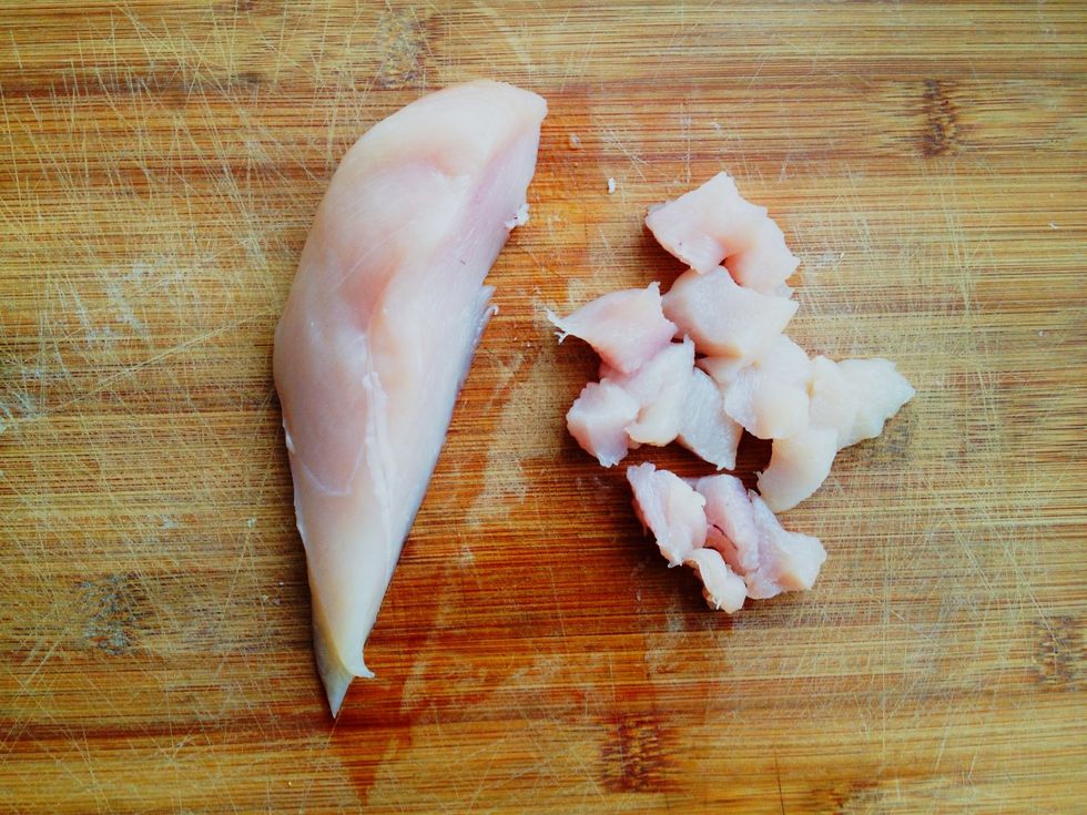 Chop chicken.