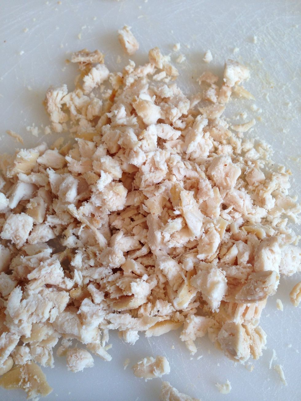 Chop chicken.