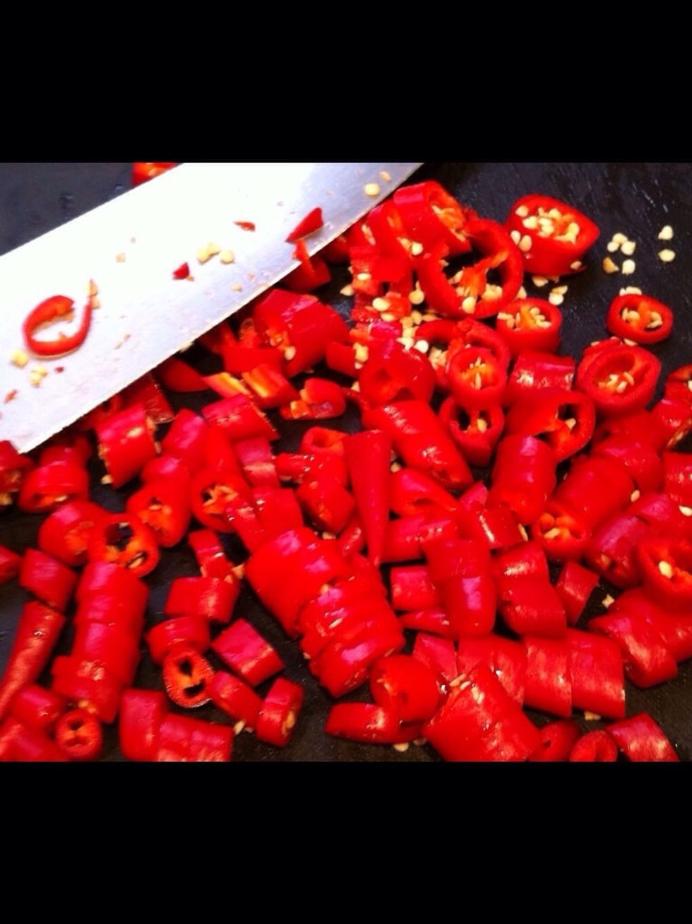 Chop chillies - keep the seeds