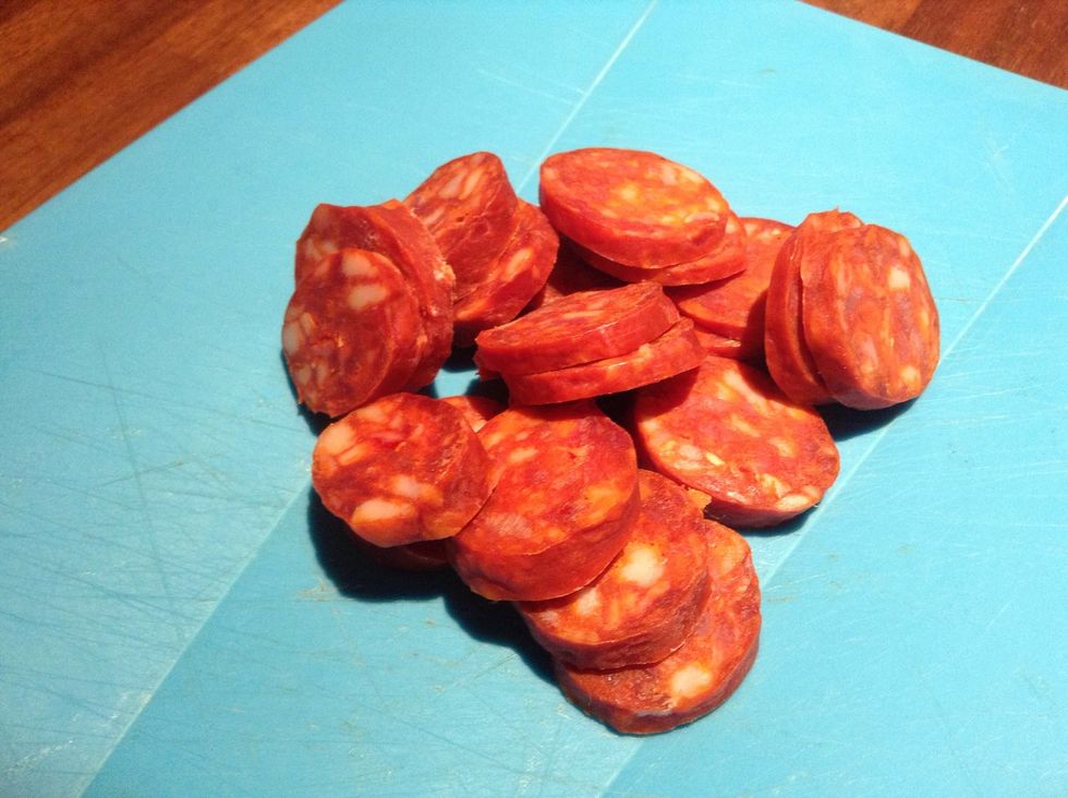 Chop chorizo into thin slices