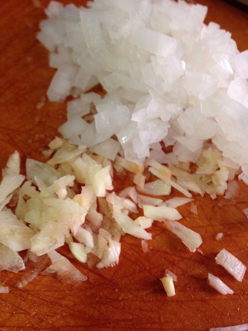 Chop garlic and onion and Cook them on a hot pan, then add the pineapple please