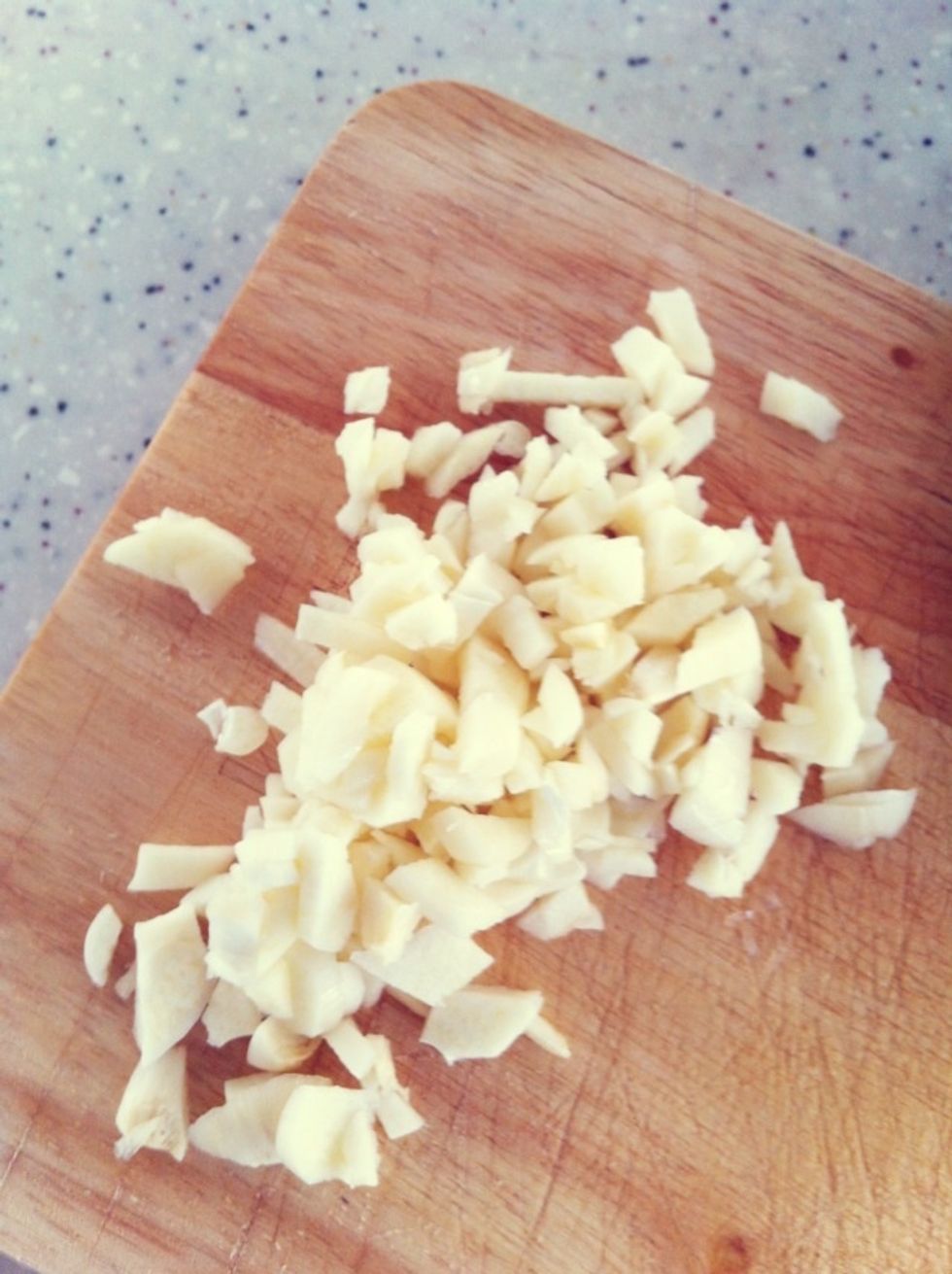 Chop garlic into small bits.