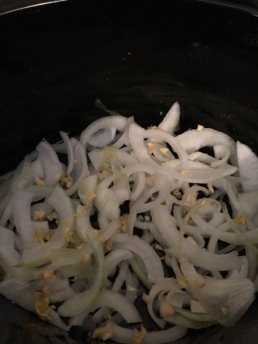 Chop garlic (like the onion) and place on onion