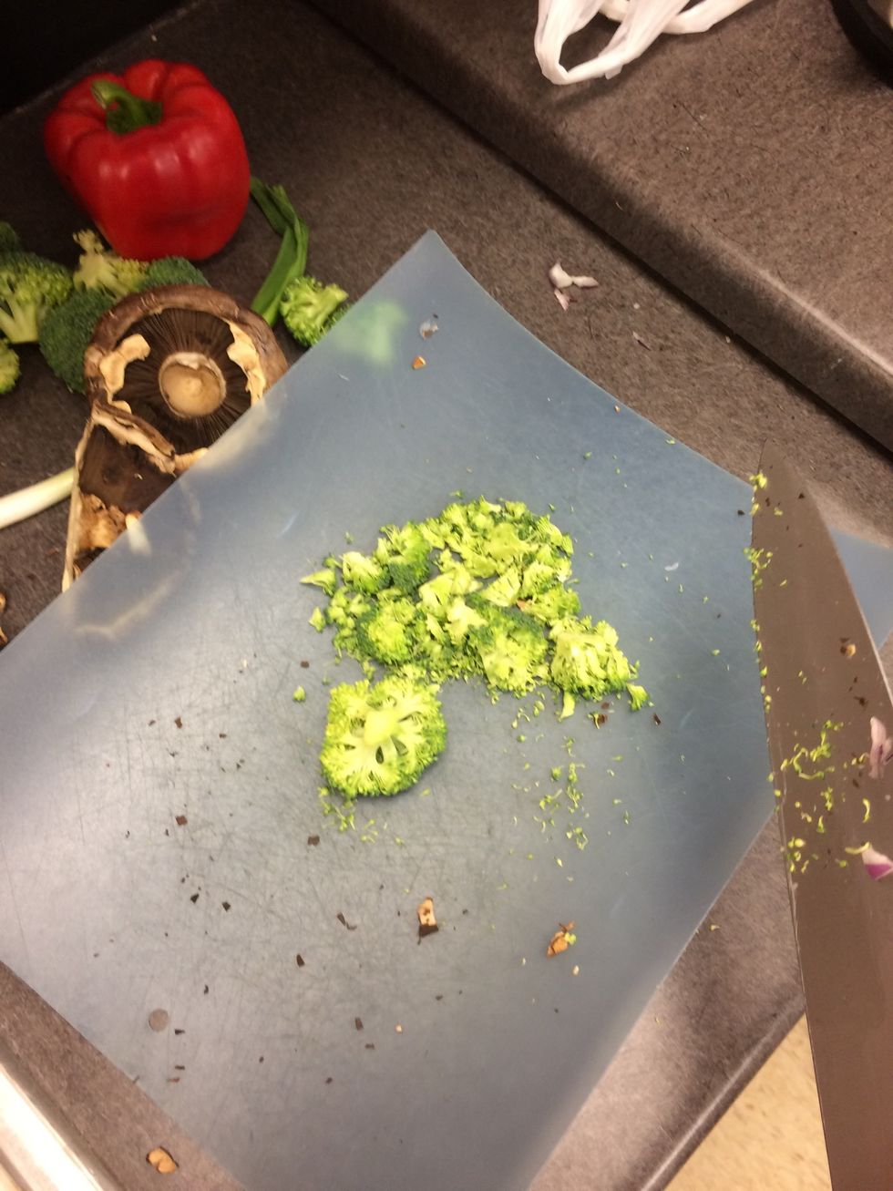 Chop half head of broccoli