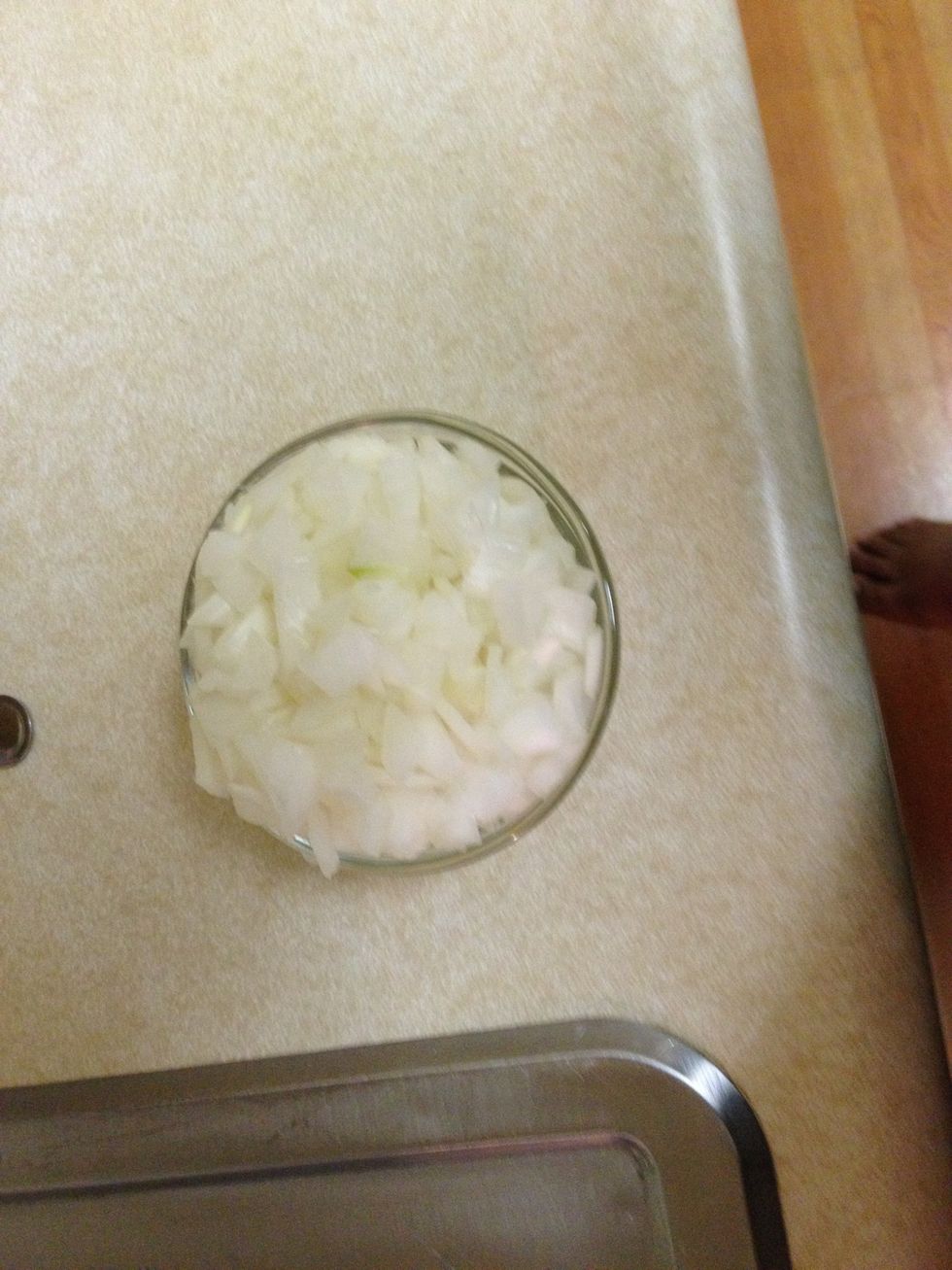 Chop half of a large onion.