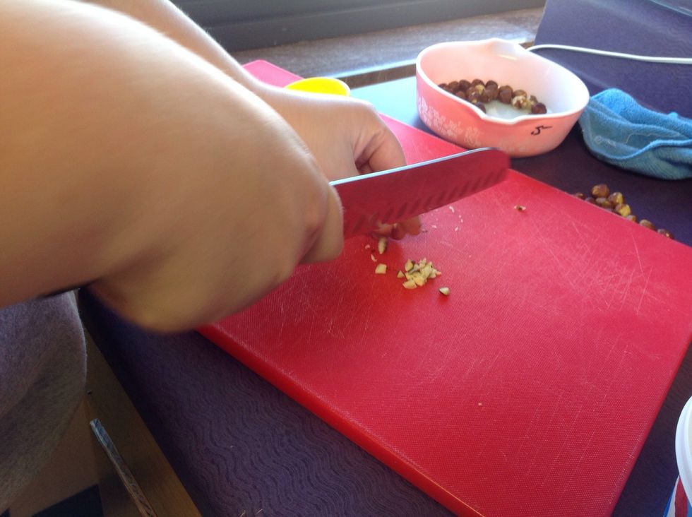 Chop hazelnuts. 1/4 cup