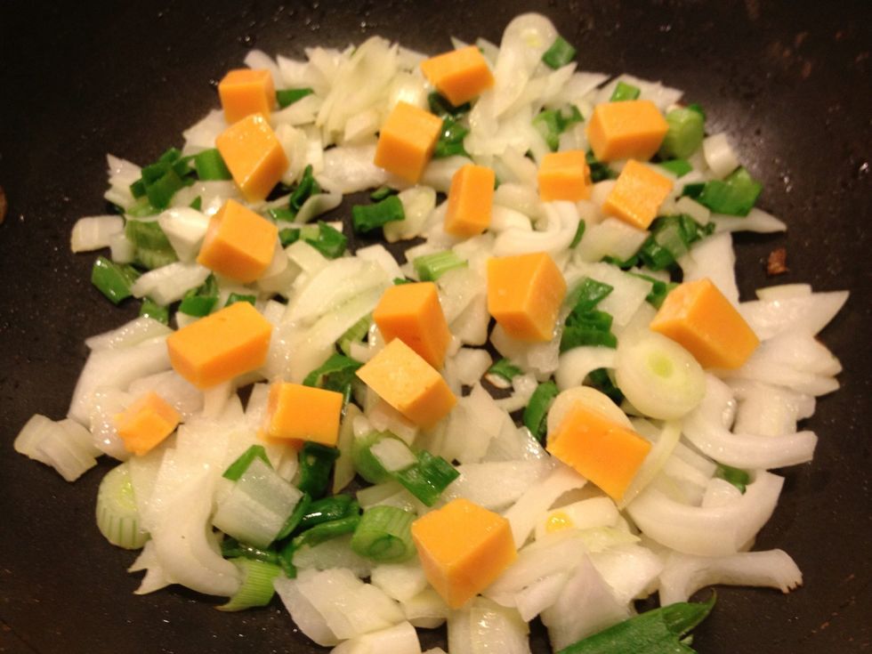 Chop & mix onions, scallions, & cheese in hot olive oil.