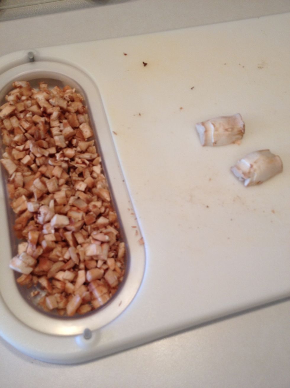 Chop mushroom stems.